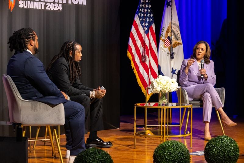 Vice President Kamala Harris (right) speaks at hip-hop star Quavo’s (center) summit to stop gun violence at the Carter Center in Atlanta on Tuesday, June 18, 2024. (Arvin Temkar / AJC)