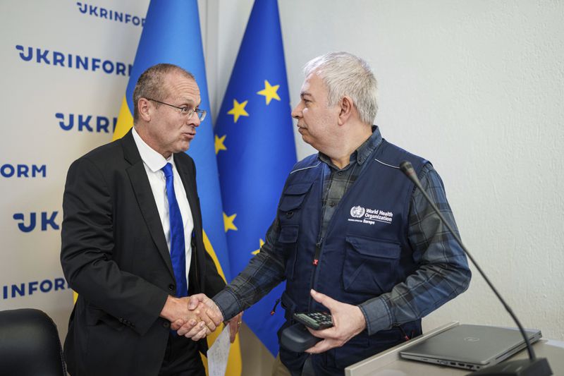 Doctor Hans Henri P. Kluge, WHO Regional Director for Europe, left, attends a press conference in Kyiv, Ukraine, Thursday Sept. 12, 2024. (AP Photo/Evgeniy Maloletka)