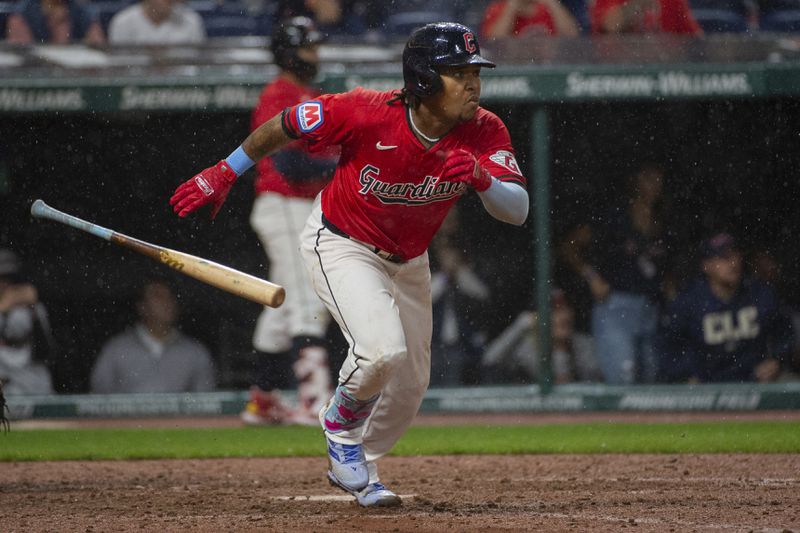 Cleveland Guardians' Jose Ramirez watches his double off Houston Astros relief pitcher Ryan Pressly during the eighth inning of a baseball game in Cleveland, Saturday, Sept. 28, 2024. (AP Photo/Phil Long)