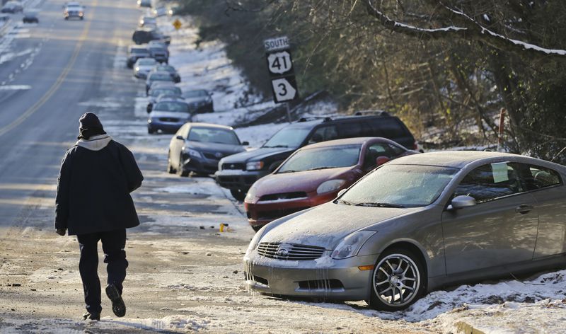 Jan. 30, 2014 Atlanta: Abandoned cars sit idle along Northside Parkway in Atlanta. The Georgia State Patrol said nearly 2000 vehicles were abandoned by metro drivers. (JOHN SPINK/JSPINK@AJC.COM)