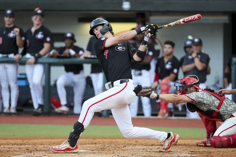 Georgia’s Charlie Condon strikes out during the third inning against N.C. State in Game 3 of the NCAA Super Regional at Foley Field, Monday, June 10, 2024, in Athens, Ga. (Jason Getz / AJC)
