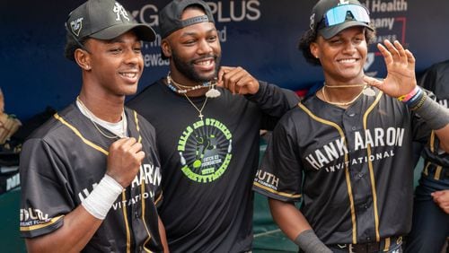 The Braves' Michael Harris II (middle) spends time with high school players at the Hank Aaron Invitational Saturday at Truist Park on August 3, 2024. (Photo by Lyndon Terrell for the Atlanta Braves)