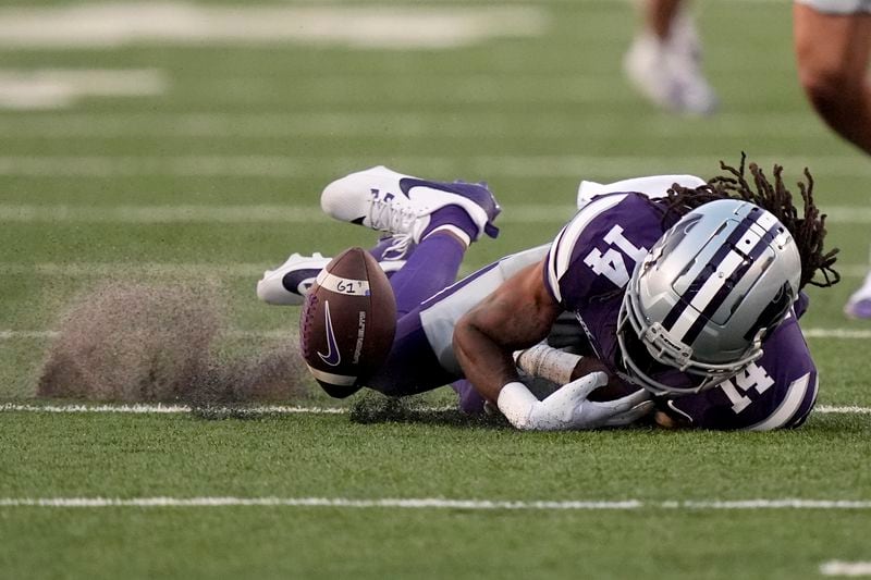 Kansas State wide receiver Dante Cephas drops a pass during the first half of an NCAA college football game against Arizona Friday, Sept. 13, 2024, in Manhattan, Kan. (AP Photo/Charlie Riedel)