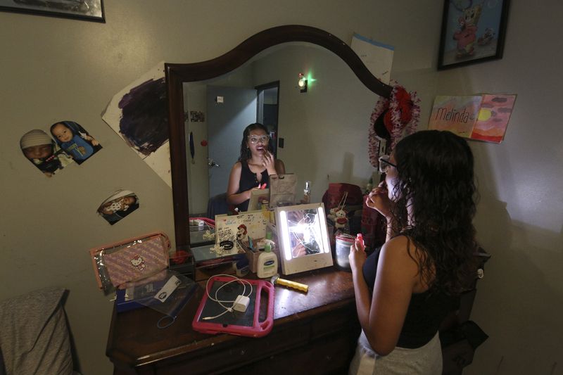 Melinda Gonzalez, 14, has benefitted from a program at Fort Miller Middle School to reduce chronic absenteeism in Fresno, Calif., Wednesday, Aug. 14, 2024. (AP Photo/Gary Kazanjian)