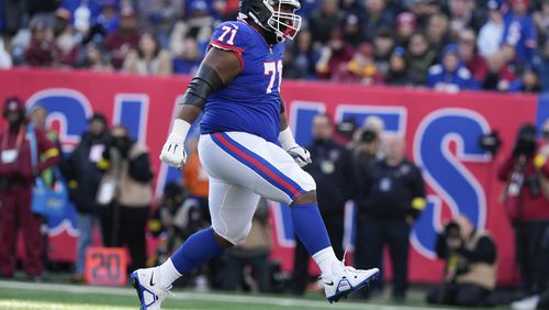 New York Giants' Justin Ellis reacts during the first half of an NFL football game against the Washington Commanders, Sunday, Dec. 4, 2022, in East Rutherford, N.J. (AP Photo/John Minchillo)