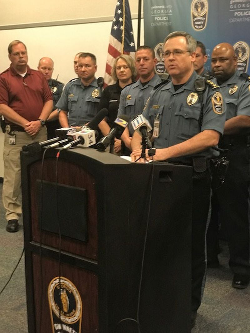 Gwinnett County police officials hold a news conference to discuss the firing of an officer who stomped the head a handcuffed man. CHRISTIAN BOONE/AJC