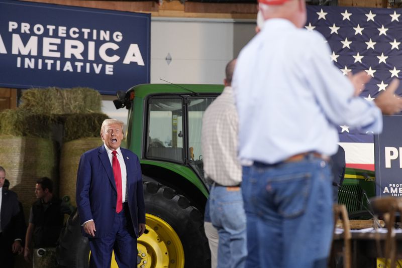 Republican presidential nominee former President Donald Trump arrives to speak at a campaign event at a farm, Monday, Sept. 23, 2024, in Smithton, Pa. (AP Photo/Alex Brandon)