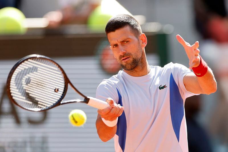 Serbia's Novak Djokovic returns the ball during a training session at the Roland Garros stadium, Saturday, May 25, 2024 in Paris. The French Open tennis tournament starts Sunday May 26, 2024. (AP Photo/Jean-Francois Badias)