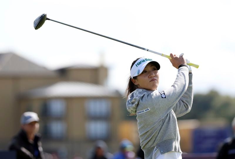 New Zealand's Lydia Ko plays her tee shot on the 4th during the third round of the Women's British Open golf championship, in St Andrews, Scotland Saturday, Aug. 24, 2024. (AP Photo/Scott Heppell)