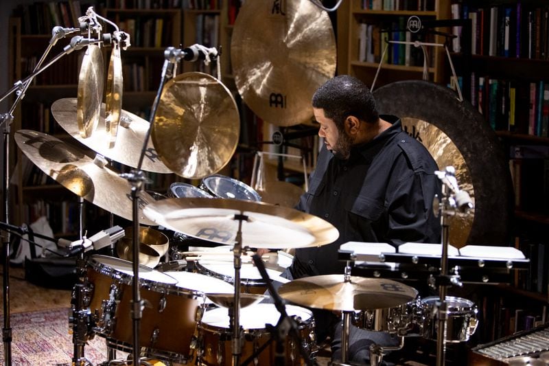 Tyshawn Sorey sits at a drum kit.