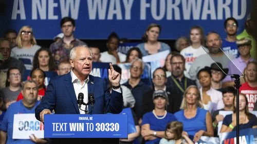 FILE - Democratic vice presidential nominee Minnesota Gov. Tim Walz speaks at a campaign rally, Aug. 17, 2024, at The Astro in La Vista, Neb. (AP Photo/Bonnie Ryan, File)