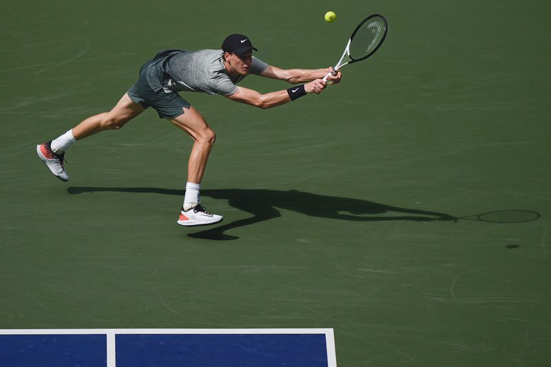 Jannik Sinner, of Italy, returns a shot to Christopher O'Connell, of Australia, during the third round of the U.S. Open tennis championships, Saturday, Aug. 31, 2024, in New York. (AP Photo/Julia Nikhinson)