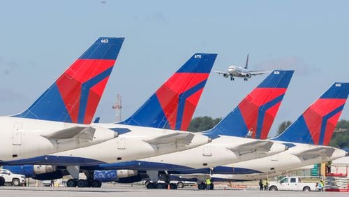 Delta airplanes are parked at Hartsfield-Jackson International Airport on Wednesday, May 22, 2024.
Miguel Martinez /miguel.martinezjimenez@ajc.com