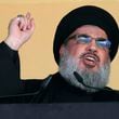 FILE - In this Oct. 24, 2015 file photo, Hezbollah leader Sheik Hassan Nasrallah addresses a crowd during the holy day of Ashoura, in a southern suburb of Beirut, Lebanon. (AP Photo/Hassan Ammar, File)