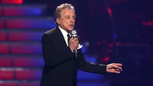 FILE - In this May 16, 2013 file photo, Frankie Valli performs at the "American Idol" finale at the Nokia Theatre at L.A. Live in Los Angeles. Valli, whose falsetto fuels The Four Seasons' music, will return to Broadway for seven shows from Oct. 21-29 at the Lunt-Fontanne Theatre. (Photo by Matt Sayles/Invision/AP, File)