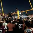 Vanderbilt fans tear down the goal post the after team's 40-35 win against Alabama in an NCAA college football game Saturday, Oct. 5, 2024, in Nashville, Tenn. (AP Photo/George Walker IV)