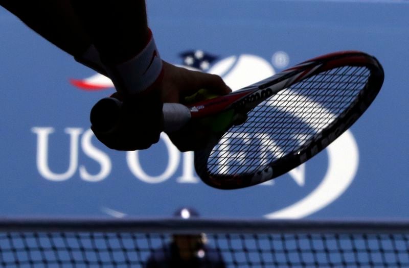 A player prepares to serve during the U.S. Open tennis tournament, Saturday, Sept. 5, 2015, in New York. An outside review of the U.S. Tennis Association’s safeguarding system makes 19 specific recommendations for how the group that oversees the sport in the country and runs the U.S. Open Grand Slam tournament can do more to protect players from abuse such as sexual misconduct. A 62-page report written by two lawyers was presented to the USTA Board of Directors last week and made public Thursday, June 27, 2024. (AP Photo/Charles Krupa, File)