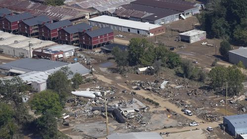 A view of damage in Asheville, N.C., is seen during an aerial tour with President Joe Biden who looked at areas impacted by Hurricane Helene near Asheville, N.C., Wednesday, Oct. 2, 2024. (AP Photo/Susan Walsh)