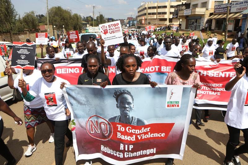 Activists and relatives of Ugandan Olympic athlete Rebecca Cheptegei march calling for an end to femicide in the western city of Eldoret, in Rift Valley, Kenya Friday, Sept. 13, 2024. (AP Photo/Andrew Kasuku)