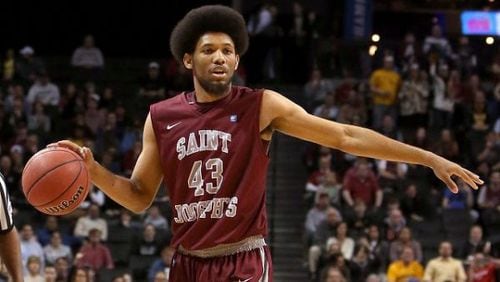 DeAndre Bembry of Saint Joseph’shandles the ball against Virginia Commonwealth during the Championship game of the Atlantic 10 Men’s Basketball Tournament at Barclays Center on March 16, 2014. (Photo by Mike Lawrie/Getty Images)