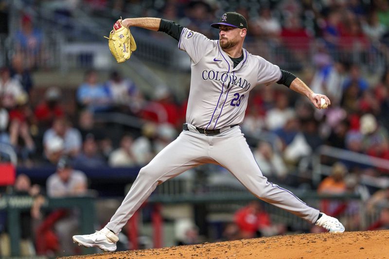 Colorado Rockies pitcher Austin Gomber throws in seventh inning of a baseball game against the Atlanta Braves, Thursday, Sept. 5, 2024, in Atlanta. (AP Photo/Jason Allen)