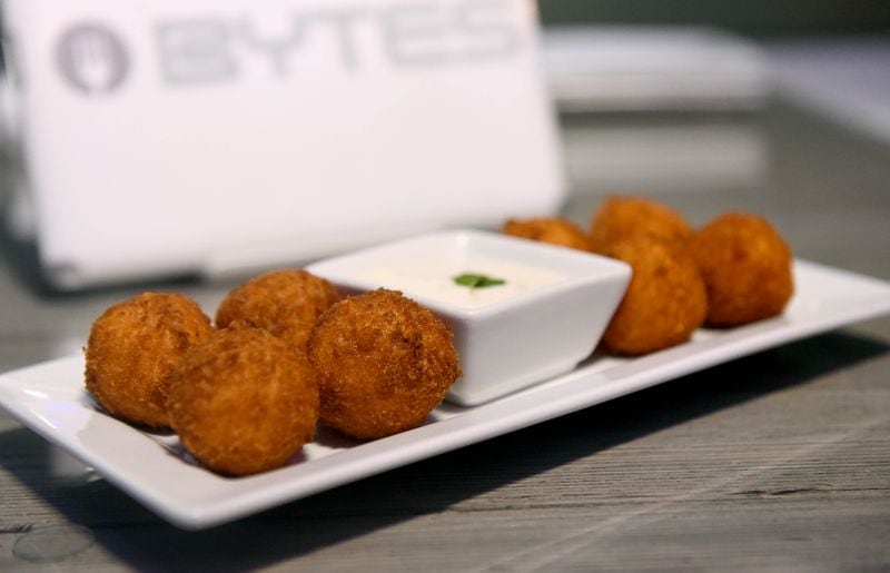 February 12, 2019 Atlanta - One of BYTES featured items on the menu are their Buffalo Chicken Bytes (oven baked chicken, buffalo sauce, cheddar cheese, and green onions). RYON HORNE / RHORNE@AJC.COM