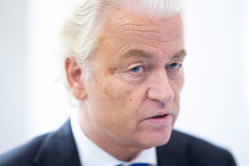 Anti-Islam lawmaker Geert Wilders answers questions after hearing the verdict against two Pakistani men convicted of threatening Wilders, at the high security court at Schiphol, near Amsterdam, Netherlands, Monday, Sept. 9, 2024. (AP Photo/Peter Dejong)