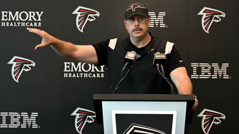 Atlanta Falcons coach 'fines' reporter for training camp absence