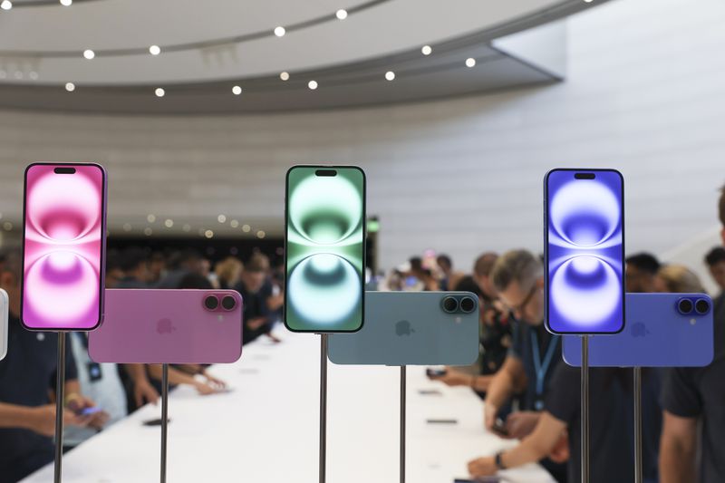 The Apple iPhone 16 is displayed during an announcement of new products at Apple headquarters Monday, Sept. 9, 2024, in Cupertino, Calif. (AP Photo/Juliana Yamada)