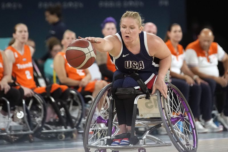 Rose Hollermann of the U.S. in action during the gold medal match of the women's wheelchair basketball between Netherlands and United States, at the 2024 Paralympics, Sunday, Sept. 8, 2024, in Paris, France. (AP Photo/Christophe Ena)