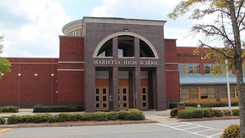 A new book charts the first generations of students who desegregated Marietta High School and follows the experiences of later generations who saw the dream of integration fall apart through a series of economic, social and demographic shifts.