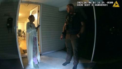 In this image taken from Illinois State Police body camera video, Sonya Massey, left, talks with former Sangamon County Sheriff’s Deputy Sean Grayson outside her home in Springfield, Ill., July 6, 2024. Footage released Monday, July 22, by a prosecutor reveals a chaotic scene in which Massey, who called 911 for help, is shot in the face in her home by Grayson. (Illinois State Police via AP)
