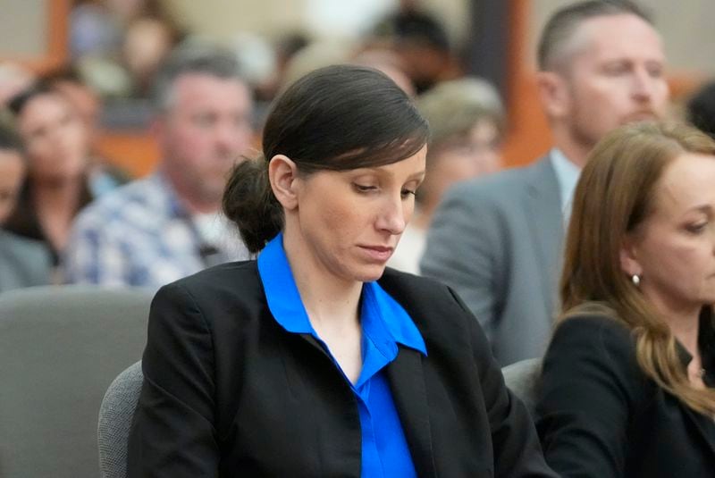 Kouri Richins, a Utah mother of three who wrote a children's book about coping with grief after her husband's death and was later accused of fatally poisoning him, looks on during a hearing Tuesday, Aug. 27, 2024, in Park City, Utah. (AP Photo/Rick Bowmer, Pool)