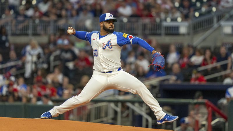 Atlanta Braves pitcher Reynaldo Lopez throws in the first inning of a baseball game against the Kansas City Royals, Saturday, Sept. 28, 2024, in Atlanta. (AP Photo/Jason Allen)