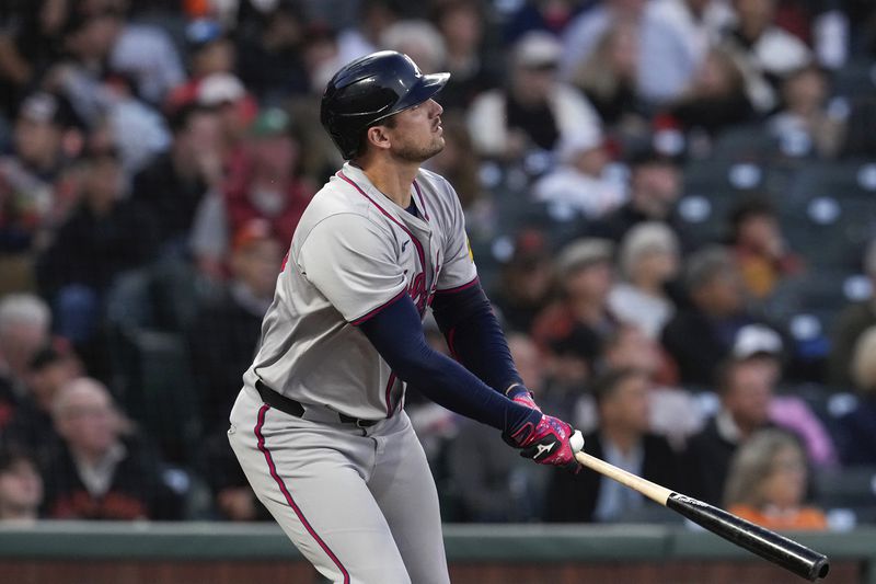 Atlanta Braves' Austin Riley watches his solo home run against the San Francisco Giants during the fifth inning of a baseball game Wednesday, Aug. 14, 2024, in San Francisco. (AP Photo/Godofredo A. Vásquez)