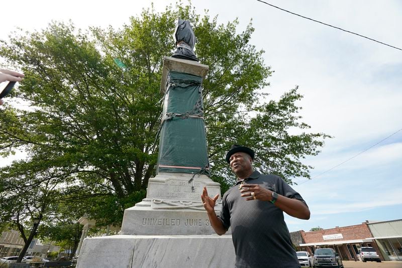 Charles Latham speaks near a century-old Confederate memorial statue in Grenada, Miss., April 12, 2023. (AP Photo/Rogelio V. Solis)