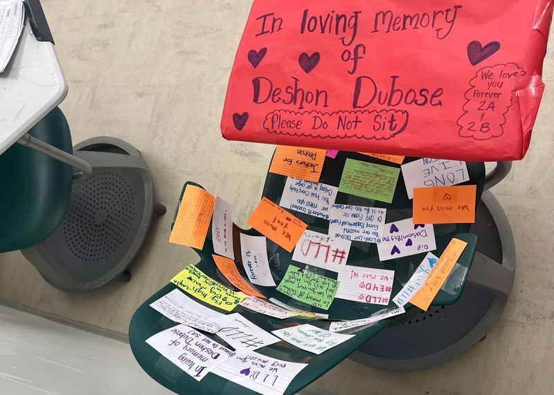 Deshon DuBose's desk was covered with notes from fellow students.