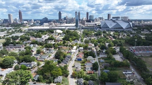 In this aerial image, part of the Vine City neighborhood is seen. The Arthur M. Blank Family Foundation has awarded nearly $4.5 million to three organizations to support workforce development in Atlanta's Westside. The grants aim to empower residents of English Avenue and Vine City with skills training and job placement opportunities.
(Miguel Martinez / AJC)