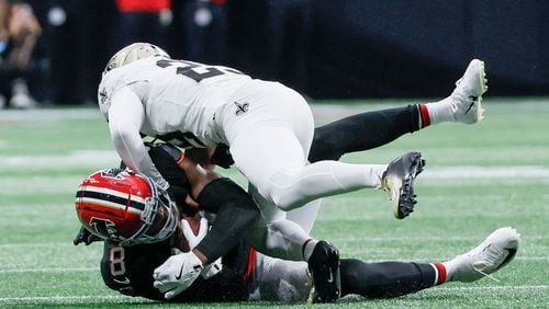 Atlanta Falcons tight end Kyle Pitts gets tackle after a catch during the first half of an NFL football game against the New Orleans Saints on Sunday, Sept. 29, at Mercedes-Benz Stadium in Atlanta.

(Miguel Martinez/ AJC)