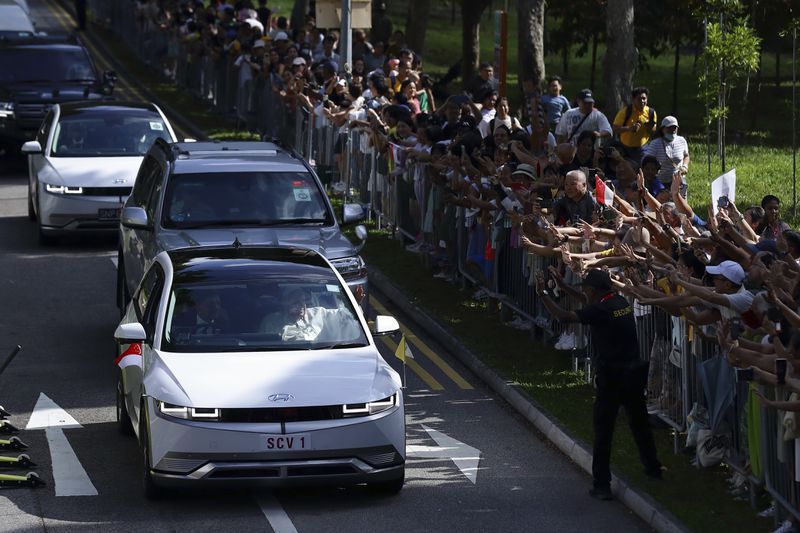 Pope Francis and entourage leave St Theresa's Home in Singapore, Friday, Sept. 13, 2024. (AP Photo/Suhaimi Abdullah)