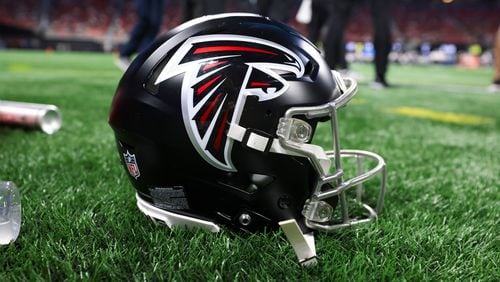 An Atlanta Falcons helmet is shown during their game against the Jacksonville Jaguars at Mercedes-Benz Stadium, on Friday, Aug. 23, 2024, in Atlanta. (Jason Getz / AJC)