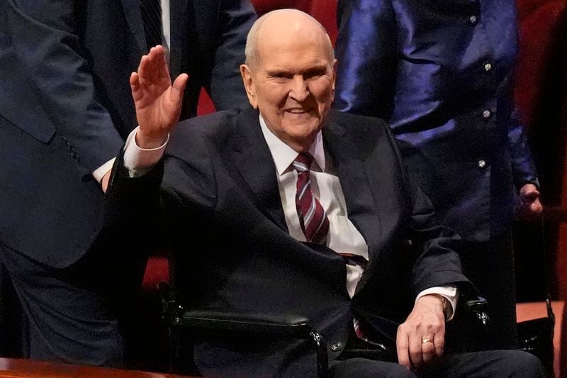 FILE - President of The Church of Jesus Christ of Latter-day Saints Russell M. Nelson waves as he departs the church's twice-annual conference, April 7, 2024, in Salt Lake City. (AP Photo/Rick Bowmer, File)