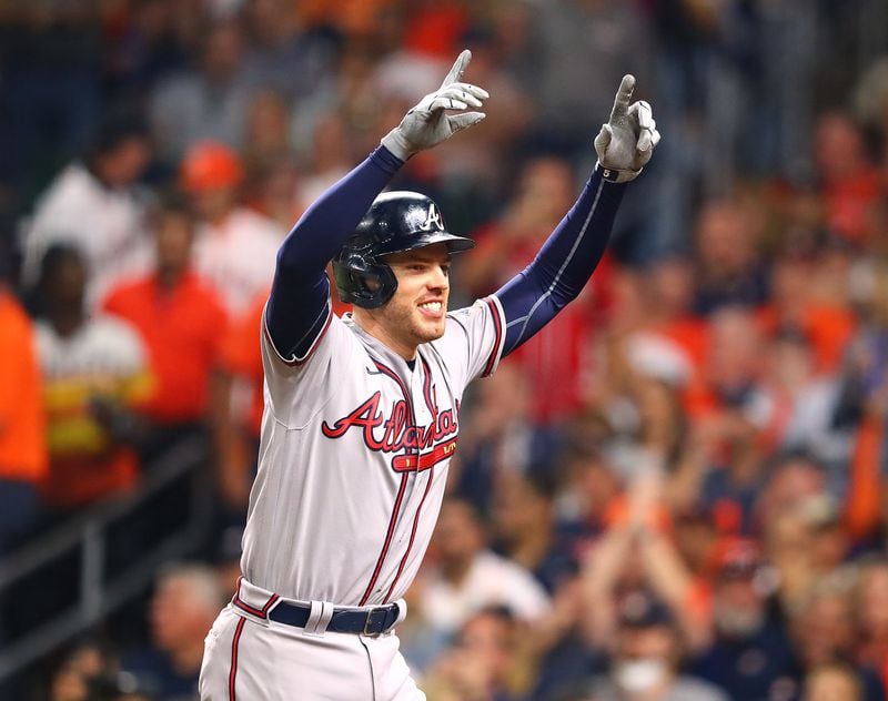 Braves first baseman Freddie Freeman reacts to his solo homer for the 7-0 lead over the Astros during the seventh inning in game 6 of the World Series on Tuesday, Nov. 2, 2021, in Houston.   “Curtis Compton / Curtis.Compton@ajc.com”