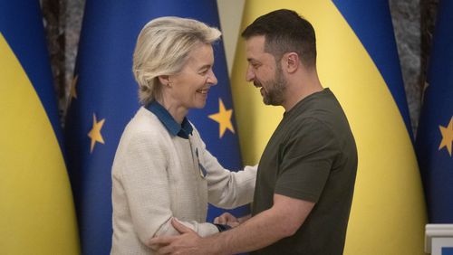 Ukrainian President Volodymyr Zelenskyy, right, and European Commission President Ursula von der Leyen greet each other in Kyiv, Ukraine, Friday, Sept. 20, 2024. (AP Photo/Efrem Lukatsky)