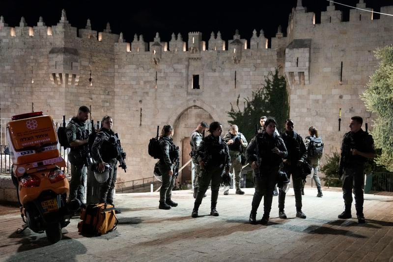 Israeli security forces stand guard near the scene of a stabbing attack at Damascus Gate in Jerusalem's Old City, Sunday, Sept. 15, 2024. (AP Photo/Mahmoud Illean)