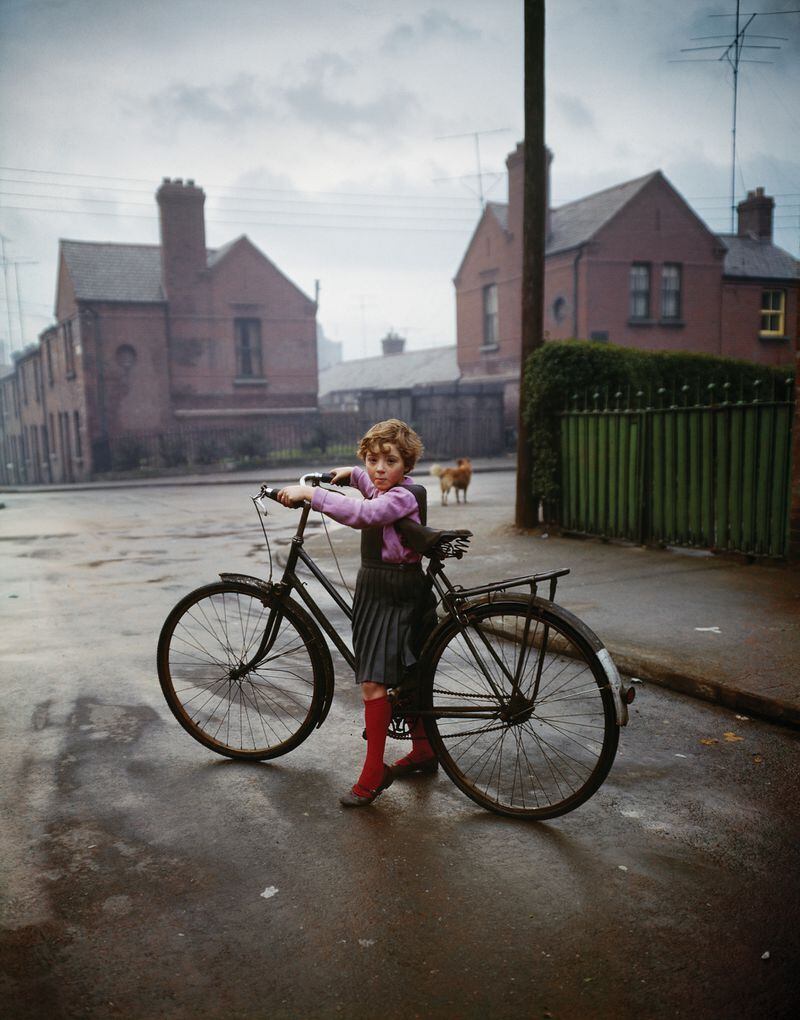 "Bicycle Girl, in the Coombe, Dublin" (1966) by photographer Evelyn Hofer. (Courtesy of High Museum of Art)