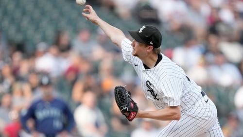 Chicago White Sox starting pitcher Erick Fedde delivers during the first inning of a baseball game against the Seattle Mariners on Saturday, July 27, 2024, in Chicago. (AP Photo/Charles Rex Arbogast)