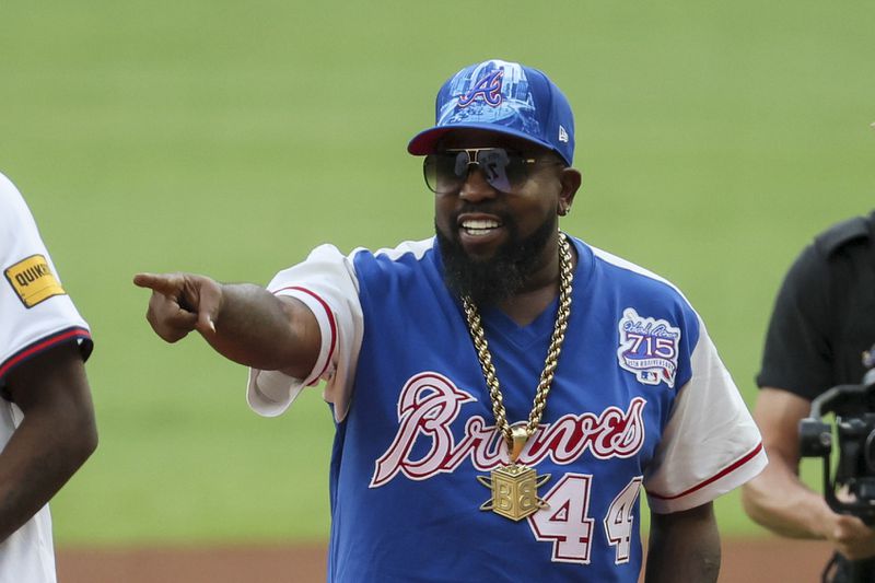 Big Boi, of Outkast, helped throw out the ceremonial pitch before the Atlanta Braves hosted the Milwaukee Brewers at Truist Park on Aug. 6. (Jason Getz/AJC)
