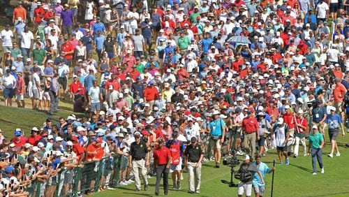 There'll be no great gathering of golf fans at East Lake and the Tour Championship this year - as there was for Tiger Woods during his 2018 victory. (Hyosub Shin/Atlanta Journal-Constitution/TNS)