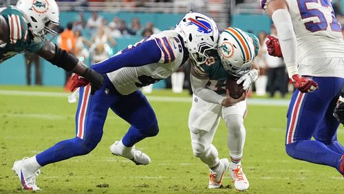 Buffalo Bills linebacker Von Miller (40) sacks Miami Dolphins quarterback Skylar Thompson (19) during the second half of an NFL football game, Thursday, Sept. 12, 2024, in Miami Gardens, Fla. (AP Photo/Rebecca Blackwell)